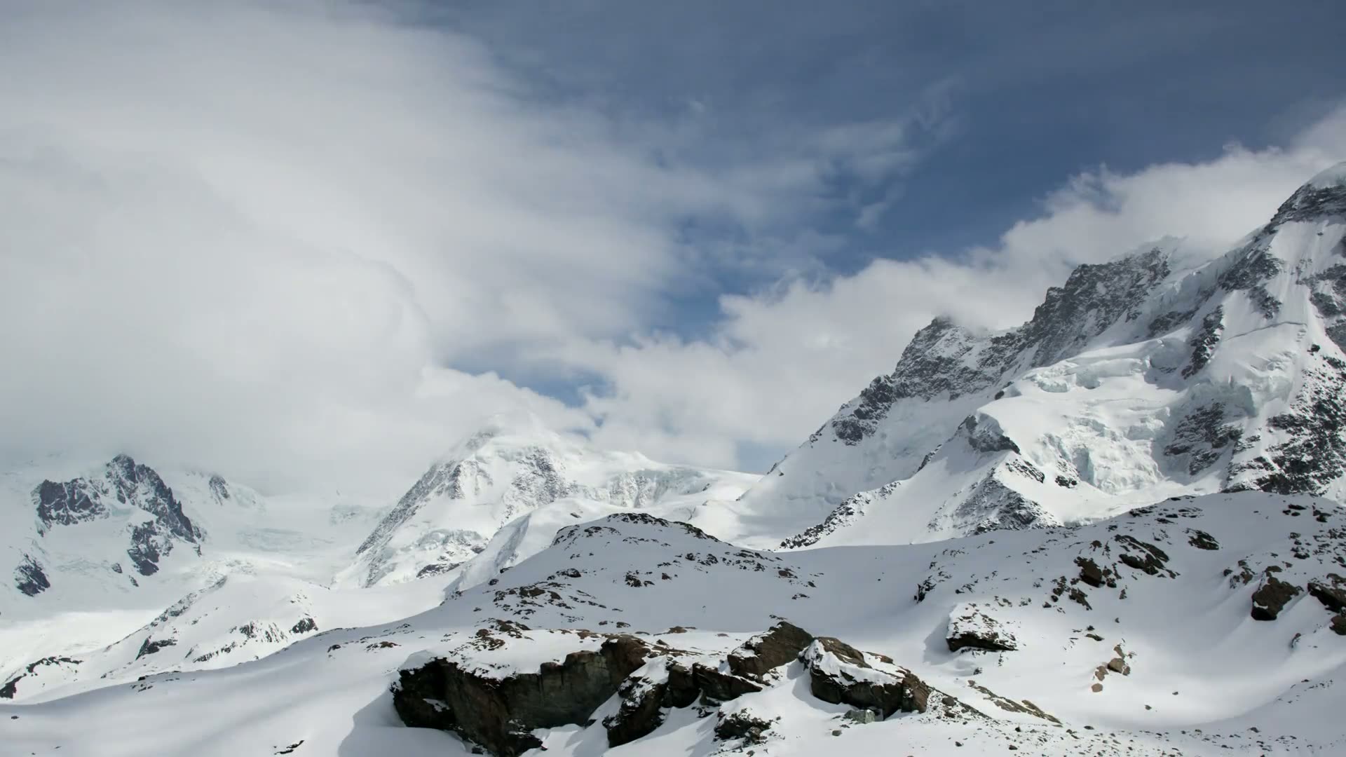 Snow covered peaks above the Swiss Alps