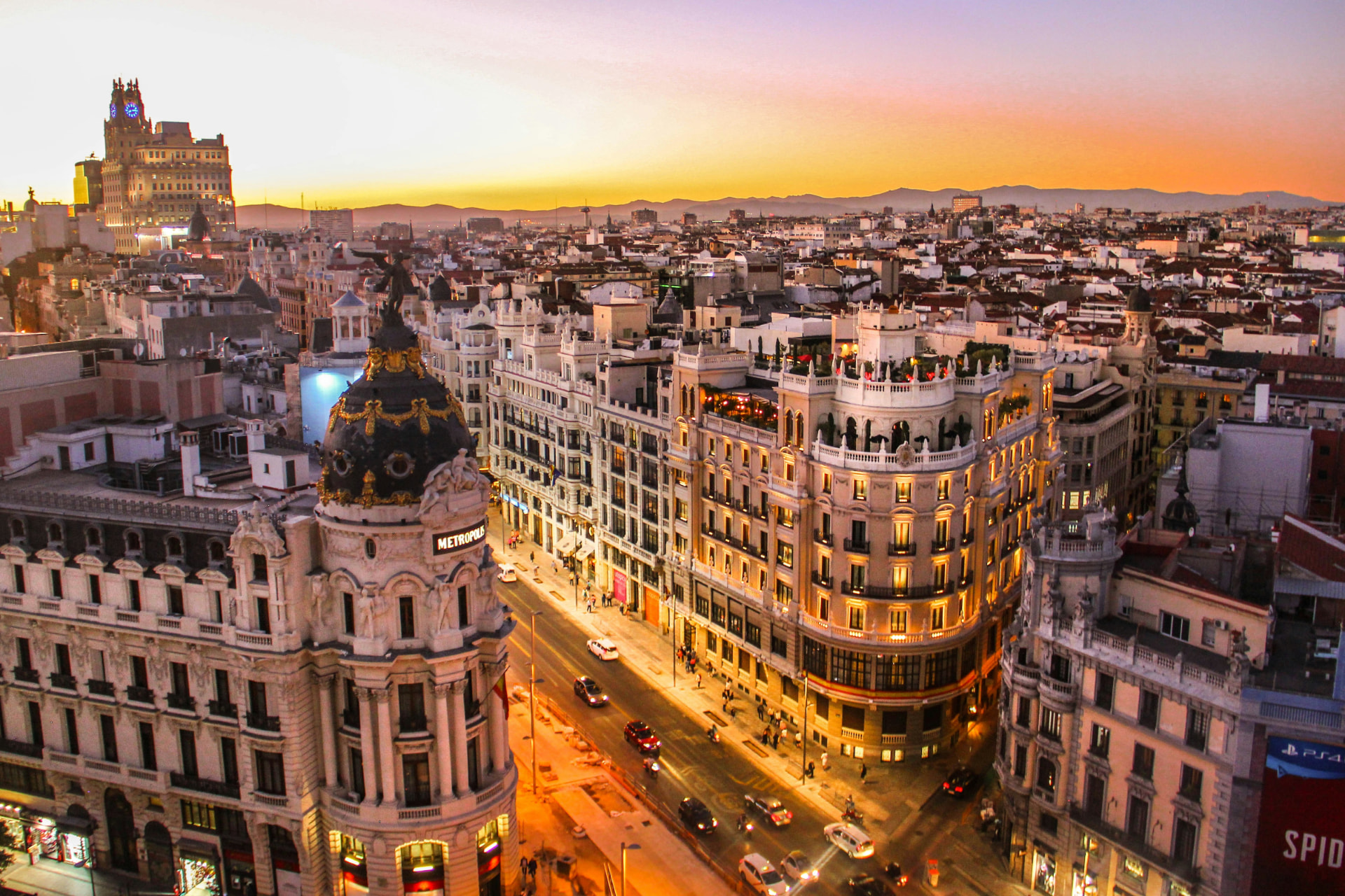 Historic Madrid rooftops glowing in warm sunset light